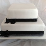 Celebrate Cakes Adult Birthday Cake two tiered with black ribbon